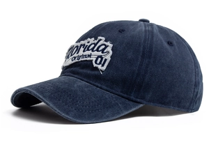 Detail of dark blue washed cotton baseball cap with Florida Original 01 vintage embroidery
