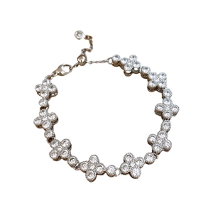 Exquisite silver clover bracelet with sparkling cubic zirconia stones and lobster clasp