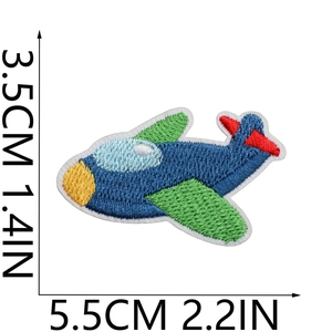 Detail of blue airplane embroidery patch with size measurements 5.5cm by 3.5cm