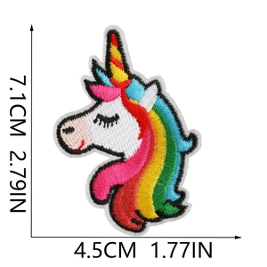 Detailed view of rainbow unicorn embroidered patch with dimensions 7.1cm by 4.5cm