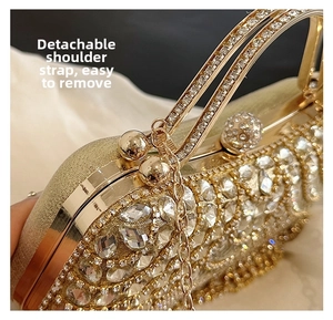 Detail of evening bag with champagne rhinestones and detachable golden chain strap