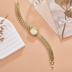 Vintage style gold square quartz watch for women with an elegant metal link strap