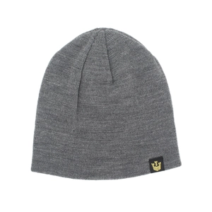Close-up of a dark grey knit beanie featuring a black woven label with a gold crown logo