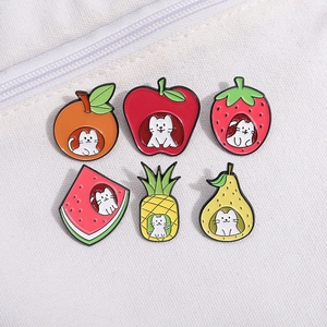 Set of 6 enamel pins featuring cute white cats hidden in colorful fruit designs on white canvas