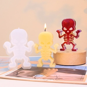 Halloween skull silicone mold set for DIY candles and resin crafts on wooden base