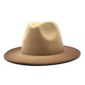 Detail of wide brim fedora hat with khaki to dark brown gradient wool felt texture
