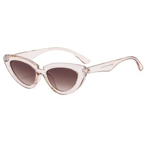 Chic cat eye sunglasses with champagne frames and brown gradient lenses at 45 degree angle