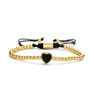 Verstellbares gewebtes schwarzes Seilarmband mit Goldperlen und Herzanhänger