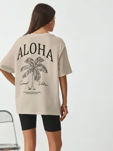 Oversized μπεζ βαμβακερό t-shirt με τύπωμα ALOHA φοίνικα και μαύρο σορτς ποδηλασίας