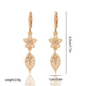 Detail view of gold floral earrings with cubic zirconia, length 4.3cm and weight 2.8g