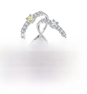 Close-up of S925 sterling silver square-cut rings in yellow and white cz colors