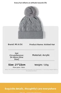 Detailed size chart for the thick cable knit beanie featuring pompom and fleece lining