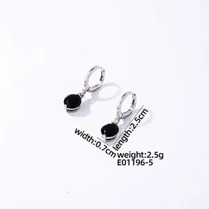 Detail view of silver drop earrings with black gemstone pendant and size measurements