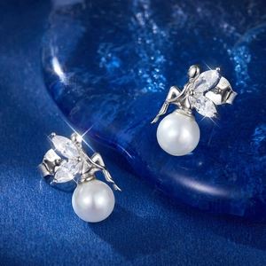 Elegant S925 sterling silver fairy stud earrings with white pearl and zircon wings