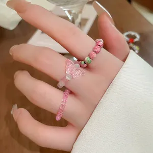 Chic beaded elastic ring set with flower charms and pink butterfly for women