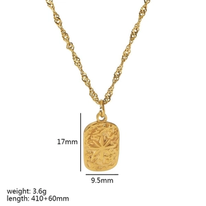Detail of 18K gold stainless steel pendant showing dimensions 17mm x 9.5mm and 3.6g weight