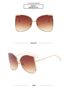 Detail of gold metal frame sunglasses with tea gradient lenses and pearl temple decor