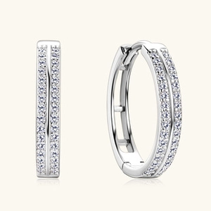 Detailed close-up of sterling silver hoop earrings with double-row micro-pave moissanite