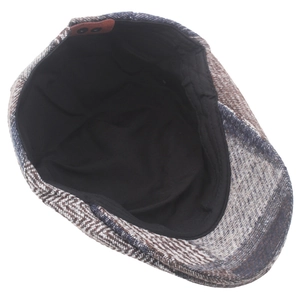 Detail view of the British newsboy cap showing wool blend fabric and inner lining