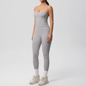 Detail of grey seamless yoga set showing double-sided brushed fabric and U-neck vest