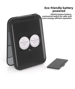 Detail of portable LED makeup mirror battery compartment with CR2032 cells and power switch