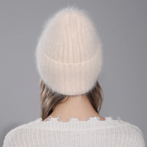 Chic cream white rabbit fur knit beanie for women providing stylish winter warmth