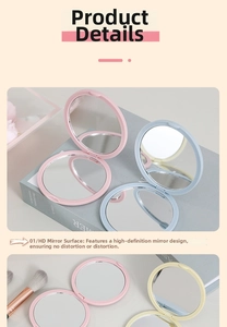 Detail of portable folding round makeup mirror in pastel colors for handbag