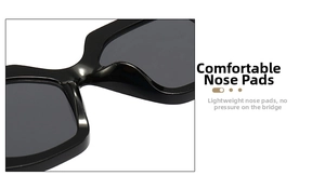 Detail view of smooth integrated black nose pads on oversized irregular sunglasses