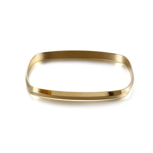 Minimalist rectangular gold titanium steel bangle with polished geometric faceted finish
