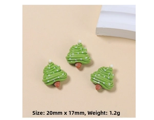 Macro detail of Christmas tree resin charms with dimensions 20mm by 17mm and 1.2g weight