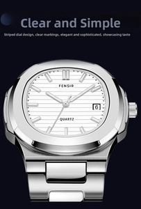 Macro shot of silver quartz watch with white horizontal dial and date window