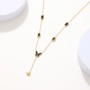 Collier en Y doré en acier inoxydable avec pendentif papillon et détails noirs