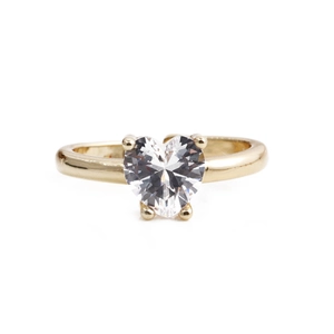 Detailed view of heart-cut cubic zirconia in a four-prong gold plated setting