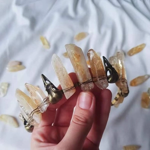 Handmade Gothic crown featuring raw yellow crystals and a bronze crow skull on metal wire