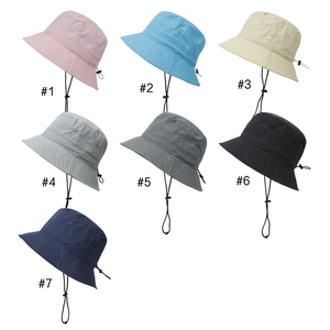 Detail of adjustable windproof ropes and multiple color options for outdoor bucket hats