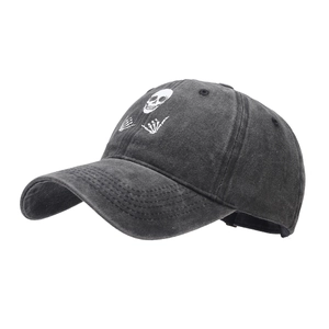 Washed cotton baseball cap in dark grey with skull and skeletal hand embroidery