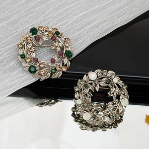 Detailed macro shot of vintage baroque wreaths with intricate crystal and pearl inlays