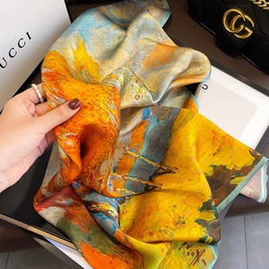 Detailed macro shot of premium faux cashmere scarf with artistic oil painting pattern
