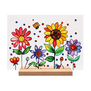 Close-up of floral acrylic desk ornament with cartoon sunflowers and a wooden base