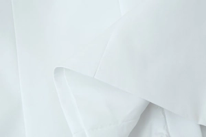 Detailed close-up showing the premium white twill weave texture of this women jacket