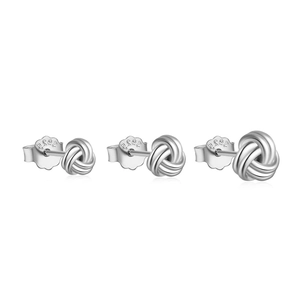 Macro detail of three different sizes of S925 sterling silver knotted stud earrings