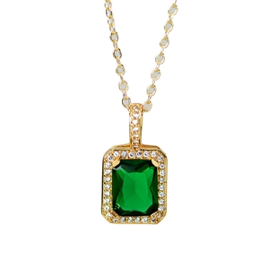Luxurious gold-tone titanium necklace with a rectangle green gemstone pendant and zircons