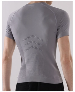 Close-up of men's compression shirt showing breathable arrow texture on the grey back