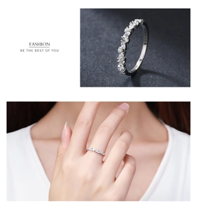 Detailed view of S925 silver marquise-cut CZ band ring showing sparkling prong-set stones