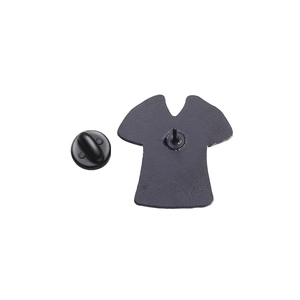 Detail view of T-shirt enamel pin back with black rubber clutch on white background