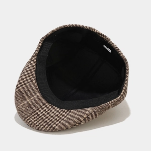 Classic houndstooth flat cap with vintage checkered pattern and soft black lining