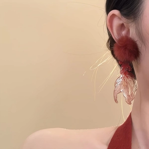 Elegant hollow goldfish earrings with red hairballs and translucent tails in a high-end style