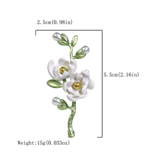 Detail view of flower brooch with white enamel petals, pearls and size dimensions