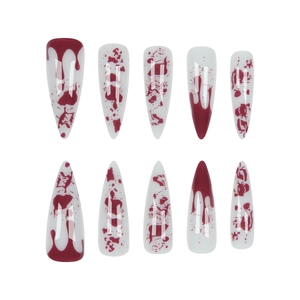 Halloween stiletto false nails with blood drip design on semi-transparent white base