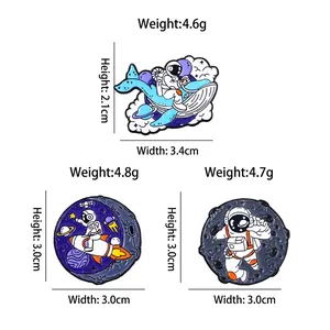 Three creative astronaut enamel brooches featuring space travel designs with dimensions